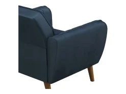 Cadeira decorativa estofada em veludo azul.