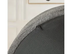 Poltrona com apoio lombar e encosto de cabeça, em tecido chenille cinzento.