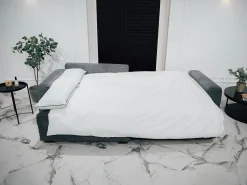 Sofá-Cama de Canto Lauren Cinza 4 Lugares com Armazenamento, Chaise Longue Reversível e Tecido Fácil de Limpar